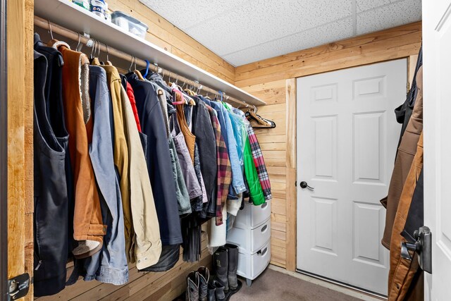 spacious closet featuring a drop ceiling