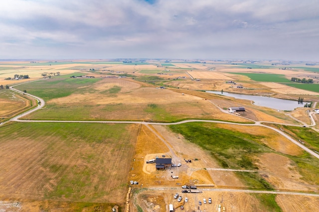 bird's eye view featuring a water view and a rural view