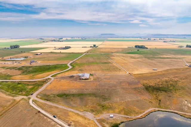 birds eye view of property featuring a rural view