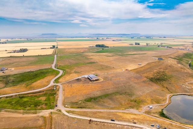 birds eye view of property featuring a rural view