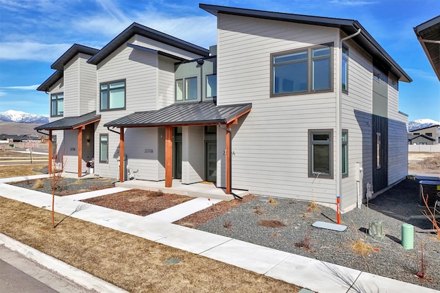 2170 Chuck Wagon Dr Unit A, Missoula, MT 59808 - contemporary home with a metal roof, a standing seam roof, and a mountain view