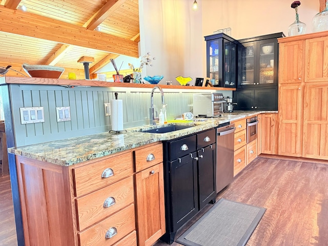 675 Bobcat Ln, Hamilton, MT 59840 - kitchen featuring wood ceiling, appliances with stainless steel finishes, a sink, and wood finished floors