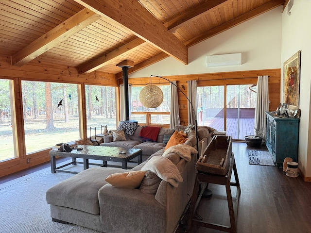 675 Bobcat Ln, Hamilton, MT 59840 - living area with wooden ceiling, vaulted ceiling with beams, and an AC wall unit