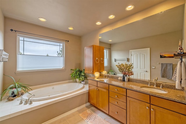 24 Sidewinder Loop, Clancy, MT 59634 - full bath featuring double vanity, a jetted tub, recessed lighting, and tile patterned flooring