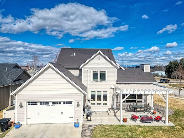 back of house featuring an attached garage, concrete driveway, roof with shingles, a pergola, and a patio area
