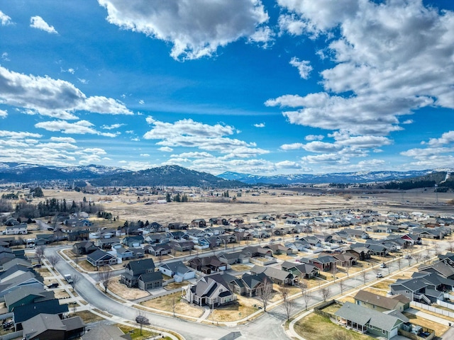 birds eye view of property featuring a residential view and a mountain view