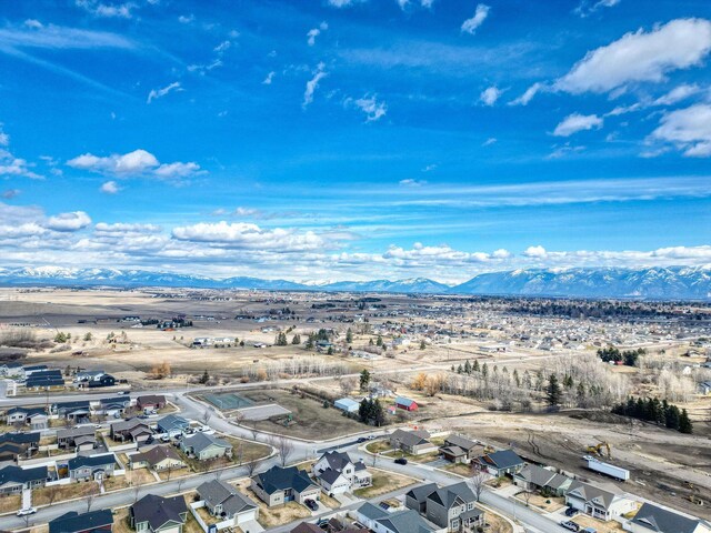 230 Camp Crook Ave, Kalispell, MT 59901 - aerial perspective of suburban area with a mountain backdrop