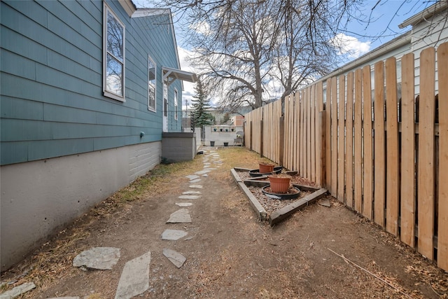 view of yard with fence