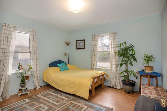 bedroom featuring wood finished floors