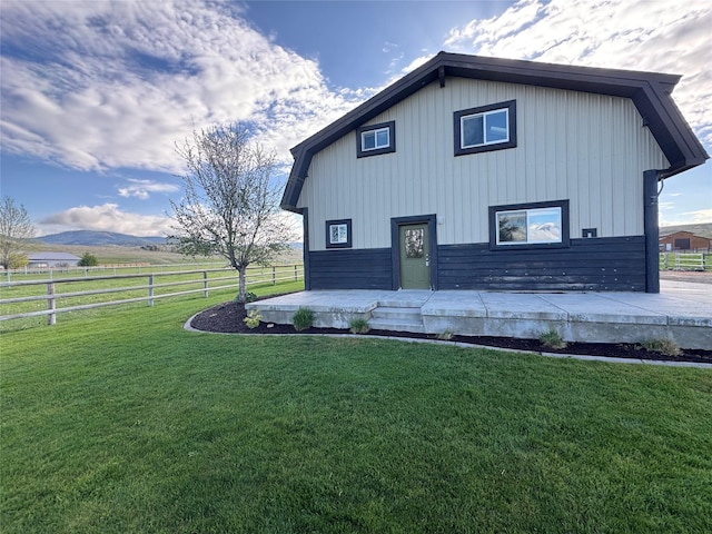 5620 Fairview Ln, Florence, MT 59833 - view of side of property with fence and a yard