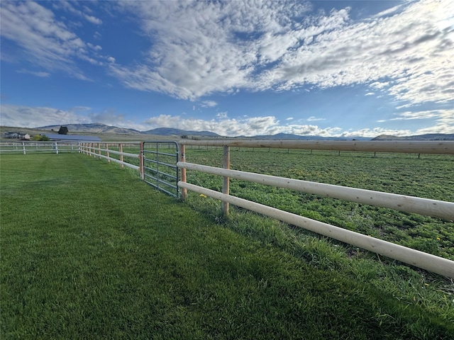 5620 Fairview Ln, Florence, MT 59833 - view of yard featuring fence, a mountain view, and a rural view