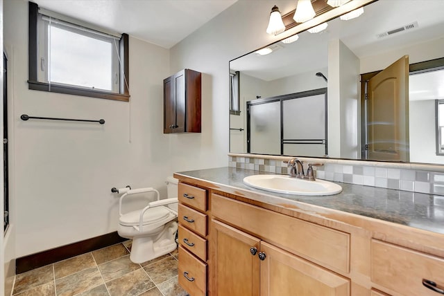 2025 Mullan Rd Unit 302, Missoula, MT 59802 - full bath featuring a shower with door, vanity, and healthy amount of natural light