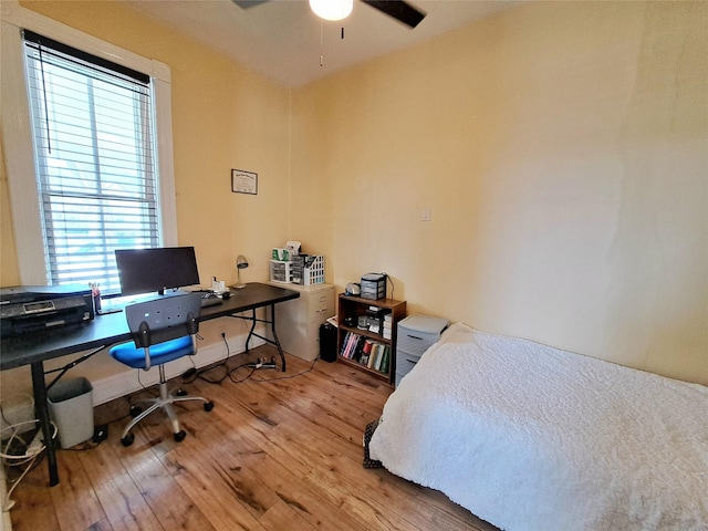 1026 11th Ave, Helena, MT 59601 - bedroom with hardwood / wood-style floors and a desk