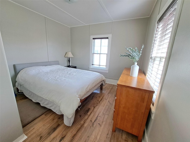 1026 11th Ave, Helena, MT 59601 - bedroom with light wood-style floors and baseboards