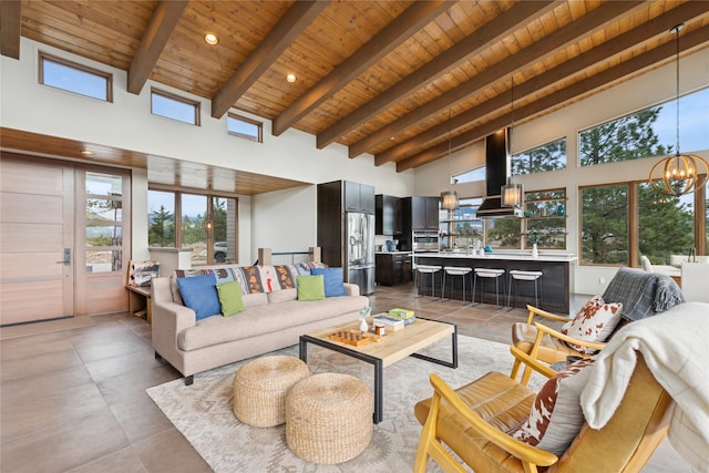 280 Cowgirl Cv, Eureka, MT 59917 - living room with high vaulted ceiling, wooden ceiling, beam ceiling, a chandelier, and recessed lighting