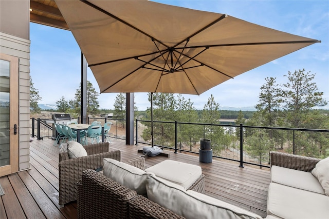280 Cowgirl Cv, Eureka, MT 59917 - deck featuring outdoor lounge area and outdoor dining area