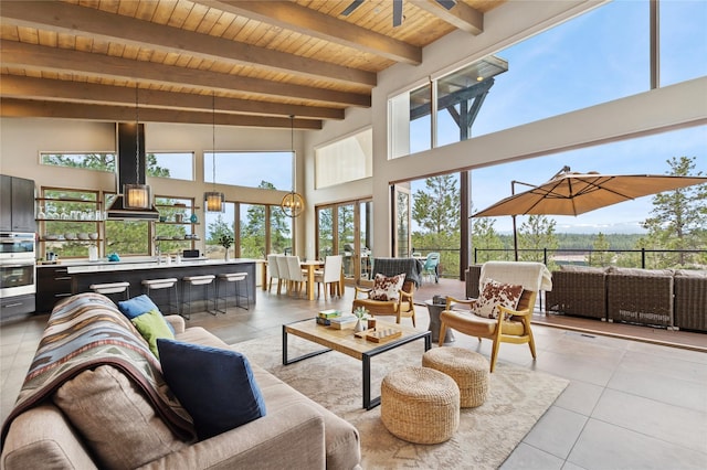 280 Cowgirl Cv, Eureka, MT 59917 - sunroom / solarium featuring plenty of natural light and beamed ceiling