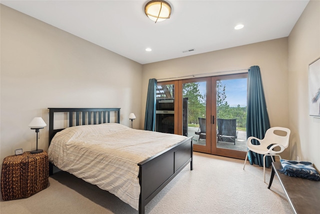 280 Cowgirl Cv, Eureka, MT 59917 - bedroom with french doors, light carpet, access to outside, visible vents, and recessed lighting