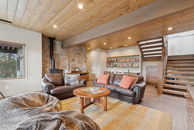 280 Cowgirl Cv, Eureka, MT 59917 - living area with recessed lighting, wooden ceiling, stairway, and a wood stove