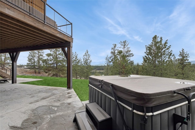 280 Cowgirl Cv, Eureka, MT 59917 - view of patio featuring a hot tub