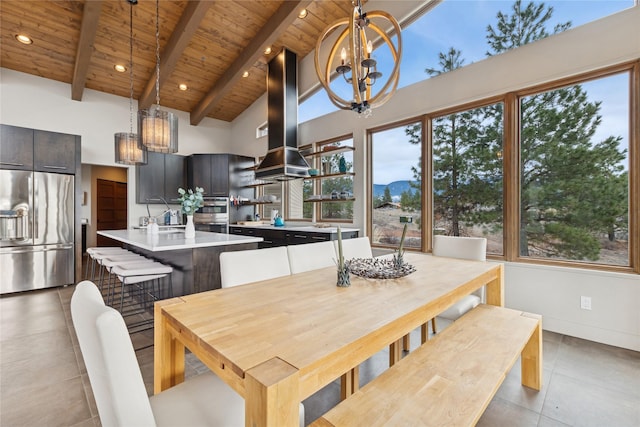 280 Cowgirl Cv, Eureka, MT 59917 - dining space featuring high vaulted ceiling, an inviting chandelier, wood ceiling, and beam ceiling