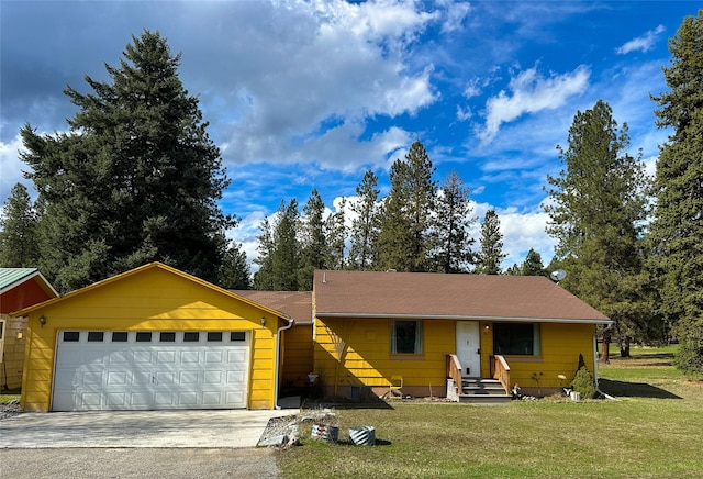 ranch-style home featuring a front yard, driveway, and an attached garage