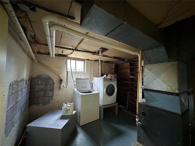 basement featuring washer and clothes dryer