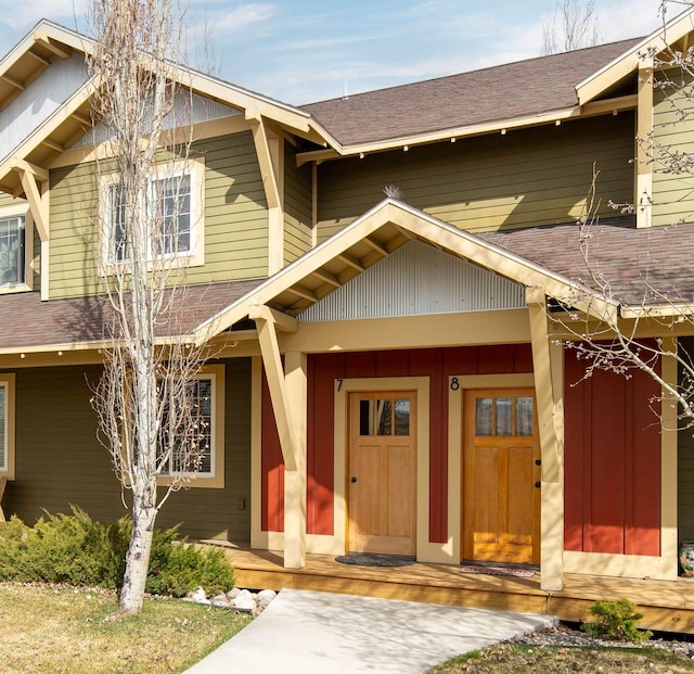 4239 W Babcock St Unit 7, Bozeman, MT 59718 - view of front facade with a shingled roof and a porch