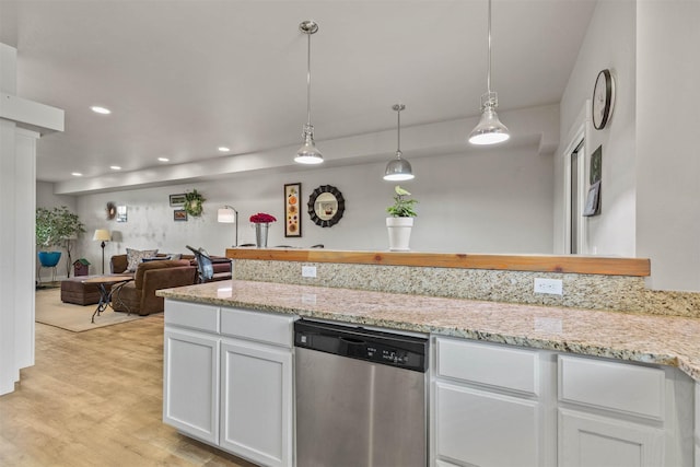 4239 W Babcock St Unit 7, Bozeman, MT 59718 - kitchen with white cabinetry, light wood-type flooring, recessed lighting, stainless steel dishwasher, and light stone counters