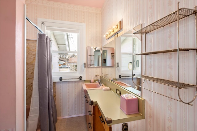 744 2nd Ave W, Kalispell, MT 59901 - bathroom with wallpapered walls, vanity, plenty of natural light, and a shower with curtain