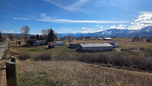 view of mountain feature with a rural view