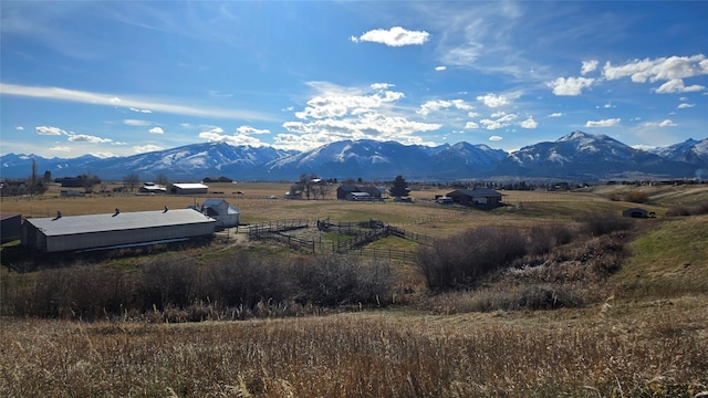 view of mountain feature with a rural view
