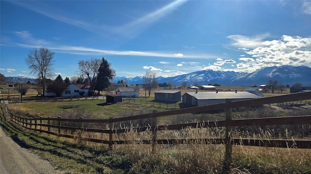 mountain view featuring a rural view