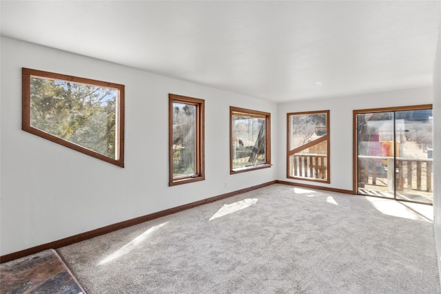 602 16th Ave E, Polson, MT 59860 - carpeted spare room featuring baseboards