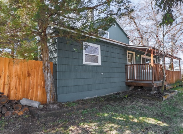 602 16th Ave E, Polson, MT 59860 - view of home's exterior with a wooden deck