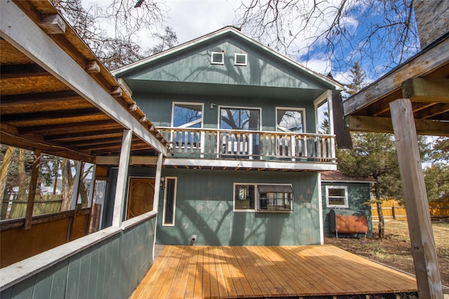 602 16th Ave E, Polson, MT 59860 - back of house with a wooden deck and a balcony