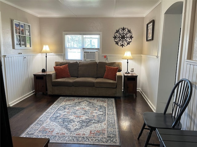15 9th St E, Columbia Falls, MT 59912 - living room featuring wainscoting, dark wood-style floors, cooling unit, and crown molding