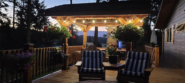 wooden deck with a gazebo