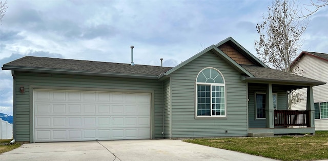ranch-style home with covered porch, driveway, a shingled roof, and an attached garage