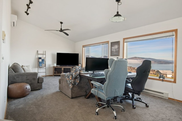 18 Mission View Dr, Polson, MT 59860 - home office featuring a baseboard heating unit, carpet flooring, ceiling fan, vaulted ceiling, and baseboards