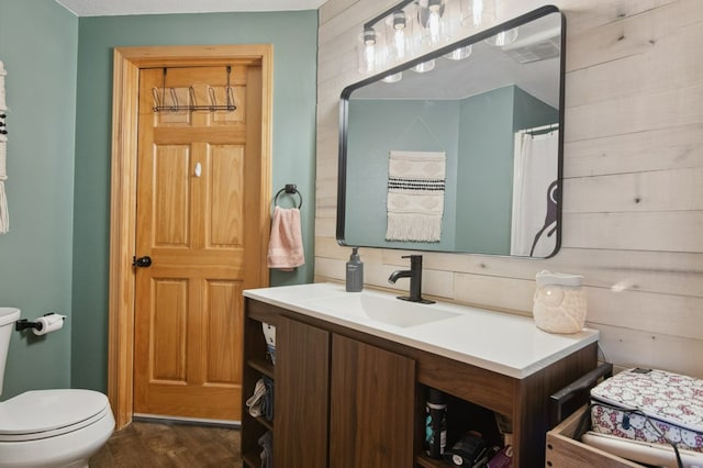 18 Mission View Dr, Polson, MT 59860 - bathroom featuring wood finished floors, toilet, and vanity