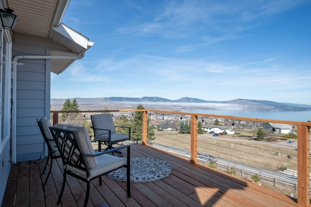 18 Mission View Dr, Polson, MT 59860 - wooden deck featuring a water and mountain view