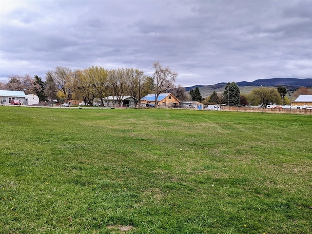 1003 4th Ave, Plains, MT 59859 - view of yard with a mountain view