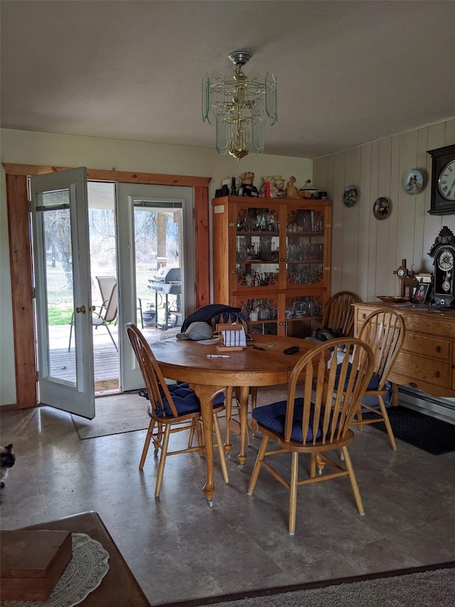 1003 4th Ave, Plains, MT 59859 - dining area with wooden walls and an inviting chandelier