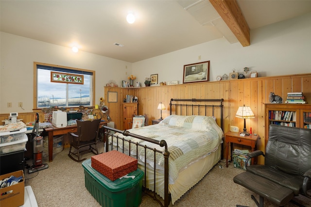 37 Bridger Meadow Ln, Pray, MT 59065 - bedroom featuring light colored carpet, a desk, beam ceiling, a wainscoted wall, and wooden walls