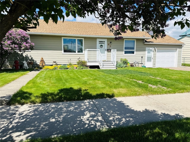 47 3rd Ave S, Stanford, MT 59479 - view of front of property with a front yard and a garage