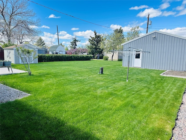 47 3rd Ave S, Stanford, MT 59479 - view of green lawn featuring an outbuilding