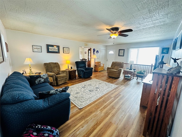 47 3rd Ave S, Stanford, MT 59479 - living room featuring wood finished floors and ceiling fan