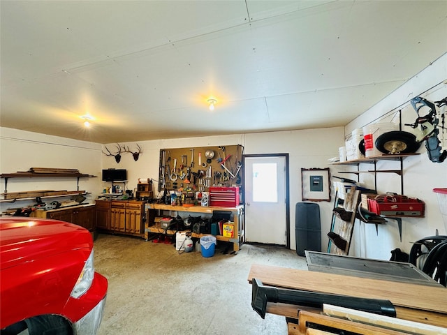 47 3rd Ave S, Stanford, MT 59479 - garage featuring electric panel and a workshop area