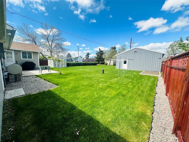 47 3rd Ave S, Stanford, MT 59479 - view of yard with an outdoor structure and a patio